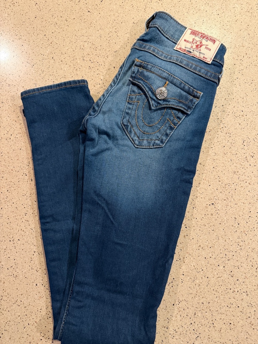 True Religion Mid Blue Slim Jeans with Signature Flap Pocket
